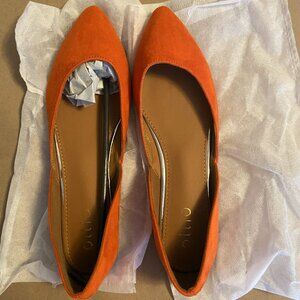 Orange suede flats